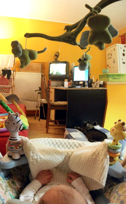 Bulcsú is watching TV.